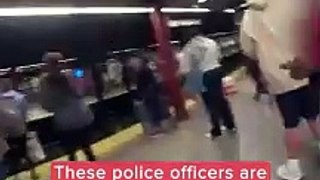 Etats-Unis: Les images impressionnantes du sauvetage d’un homme, tombé sur les rails à New York, par des policiers alors qu’un métro était sur le point d’arriver en station - Regardez