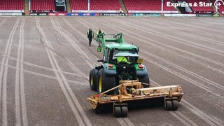 The unusual sight of Walsall FC pitch, as it is removed ready for reseeding.