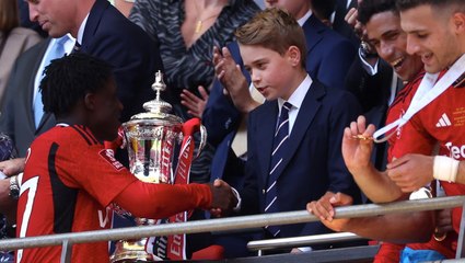 Prince William and Prince George award Manchester United FA Cup trophy