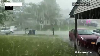 Hail litters ground during tornado-warned storm in Missouri