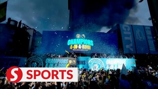 Champions Manchester City celebrate fourth successive title in blue parade