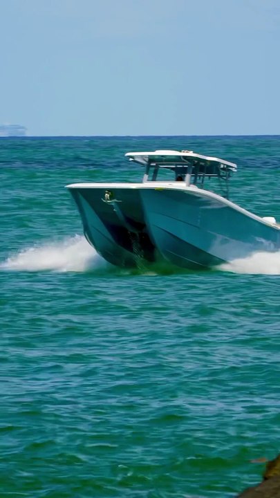 New catamaran spotted today at the Haulover Inlet in Bal Harbour, Florida. Can you identify the make.