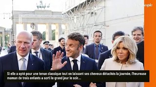 Brigitte Macron en chignon très travaillé : impériale dans une robe longue bleu nuit délicatement brodée face à ses hôtes à Berlin