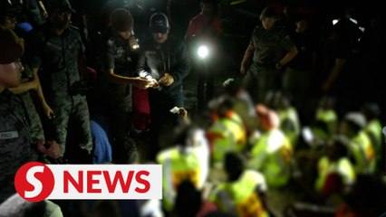 Immigration raids illegal settlement built on government reserve land in Sentul