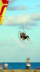 Paramotor Pro riding it like a roller coaster today at the Haulover Inlet and beach in Bal Harbour, Florida