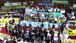 Thousands protest in Taiwan as contested reforms pass