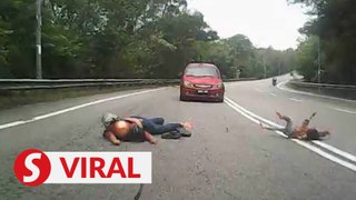 Woman, toddler cheat death after falling tree branch knocks them off motorbike near Bukit Putus