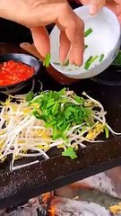 Chinese burger Stir-fried mung bean sprouts on stone slab