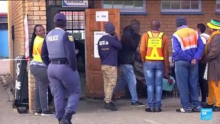 Miles-long queues at polling stations in South Africa with ANC rule in balance