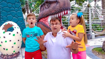 Diana and Roma learn about dinosaurs and play with different illusions at the Dubai Museum