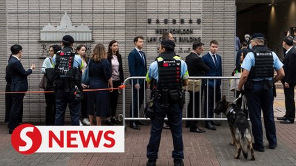 Fourteen Hong Kong democrats found guilty in landmark subversion trial, two acquitted