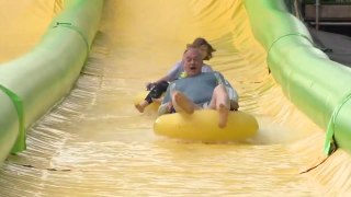 Ed Davey enjoys Slip N Slide in Somerset during election campaign