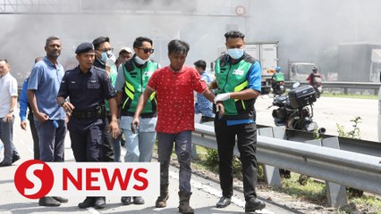 Nine foreign workers rescued from burning billboard along Federal Highway