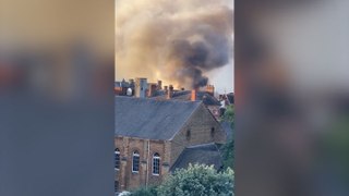 Thick black smoke billows across Northampton town centre as crews battle ‘large-scale’ fire