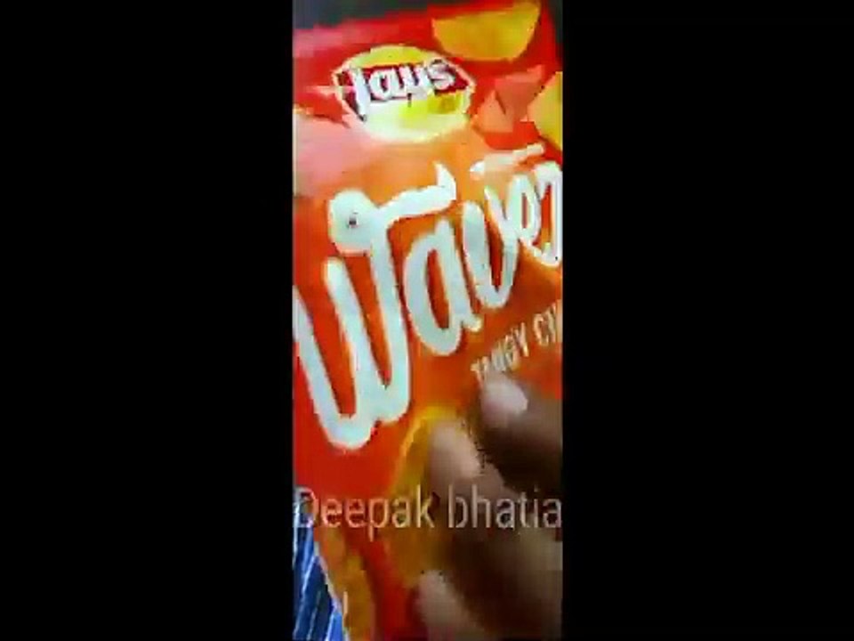 Lays Wavez tangy chilli twist chips