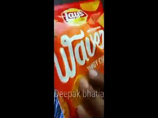 Lays Wavez tangy chilli twist chips
