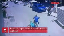 Ölümden döndü! Eteği motosikletin zincirine takılan kadın yerde sürüklendi