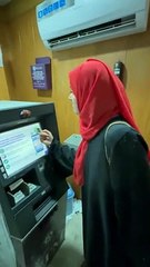 A girl taking lone from ATM | Pakistan | India | Karachi | Lahore