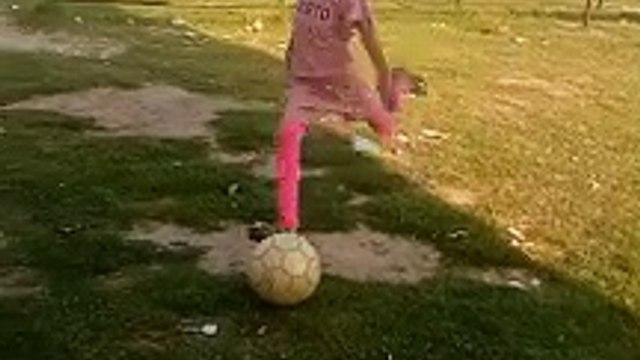 Cute shooter of football player