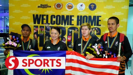 Hasmunirah, Muhamad Ayub win first world disabled lawn bowl titles in their perfect debut