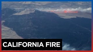 Firefighters battle central California grassfire