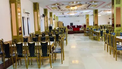 Banquets special guest family chair setup view.