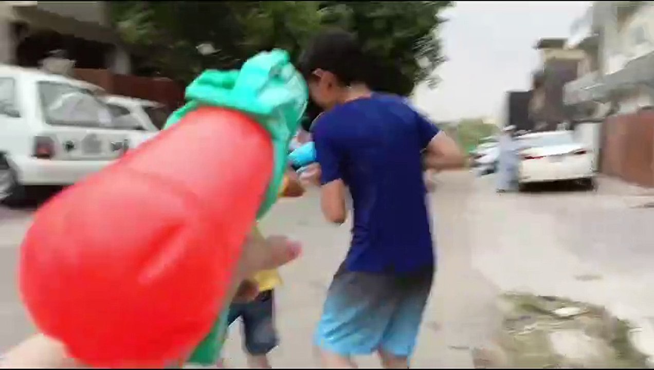 Water Gun Fun with MustafaKidPresident and Friends!"#MustafaKidPresident #WaterGunFun #StreetPlay #FriendshipGoals