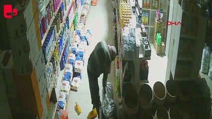 Duvarı balyozla kırıp marketi soydu