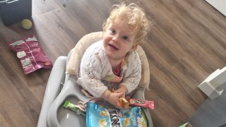 Cute moment baby caught raiding the snack cupboard