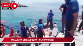 Kayalıktan denize düştü, 50 metre açıkta polis kurtardı