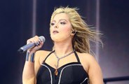 Bebe Rexha had fans removed from her concert after for throwing things on stage