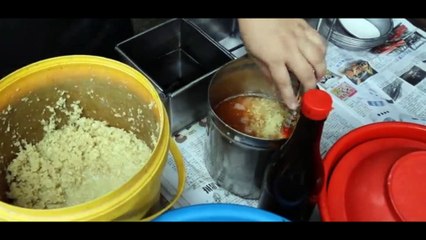 Unique chicken rice, cooked using a charcoal stove