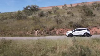 New Renault Captur E-Tech full hybrid 145 in Techno white Driving in the country
