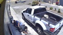 Man Repairing Truck From Underneath Saved as Truck Begins to Move