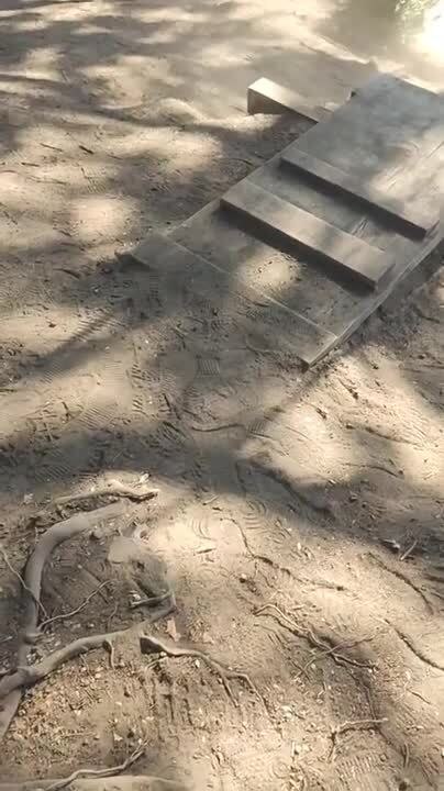 Guy Pushing Wife on Swing Loses Balance and Falls Downhill