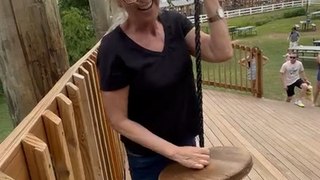 Woman Trying to Ride Zipline Falls on Ground