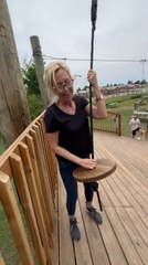 Woman Trying to Ride Zipline Falls on Ground