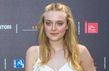 Dakota Fanning has received a new pair of shoes from Tom Cruise every year