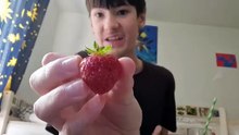 eating a strawberry
