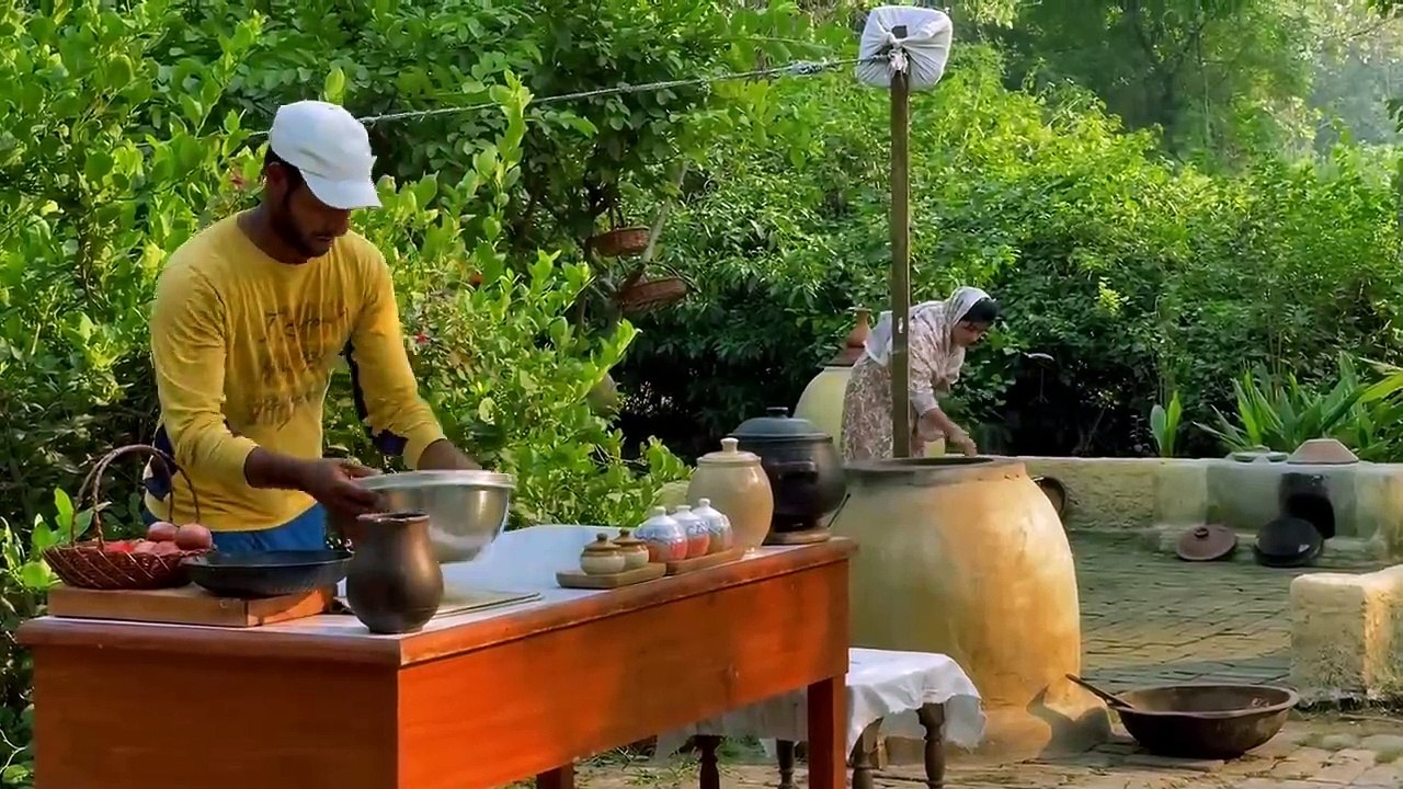Cooking Kashmiri Mutton Rogan Josh Korma with Tandoori Bread