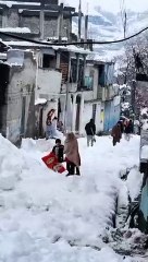 Girls enjoying during snow falls
