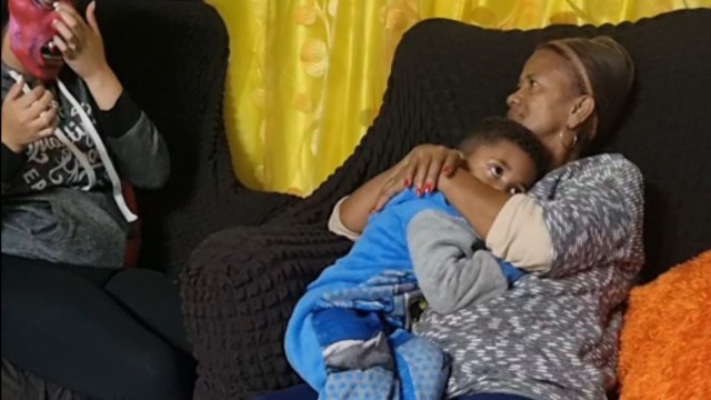 Unmasking mayhem: Mom's scary mask sends shivers down her son's spine