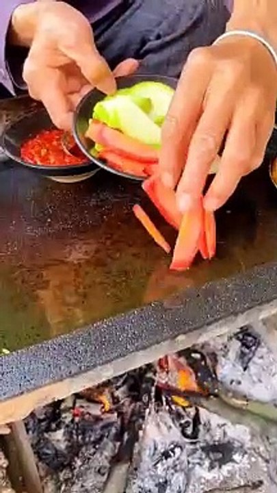 Chinese burger Fried zucchini on stone plate