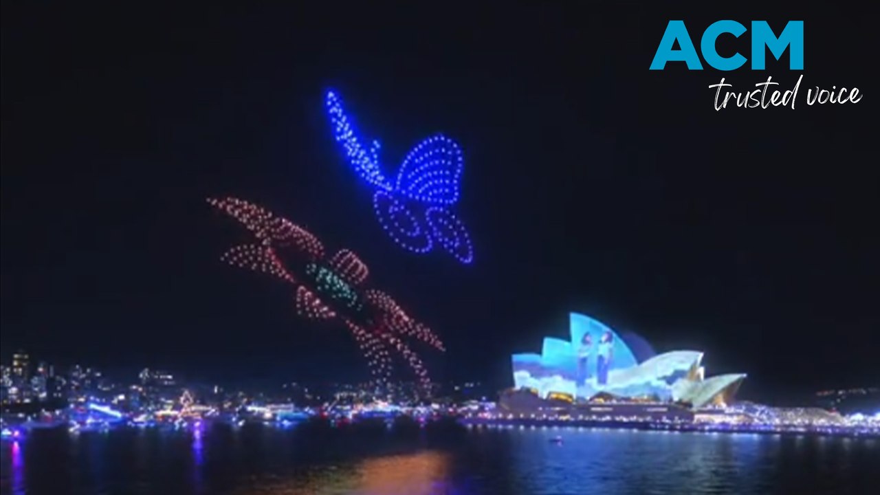 Thousands cram into Circular Quay to watch the Vivid Sydney drone show