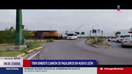 Download Video: Tren embiste camión de pasajeros en Nuevo León