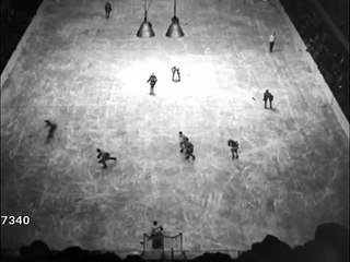 Various action shots from game between Boston Bruins and the New York...