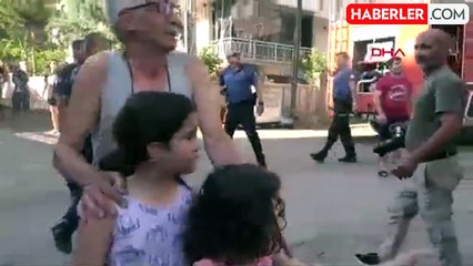 Antalya'da çıkan yangında mahsur kalan anne ve oğlu kurtarıldı