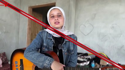 Gaza Musician Plays Guitar Amid Rubble to Spread Hope and Awareness