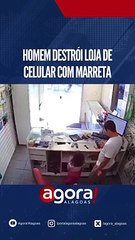 HOMEM DESTRÓI LOJA DE CELULAR COM MARRETA