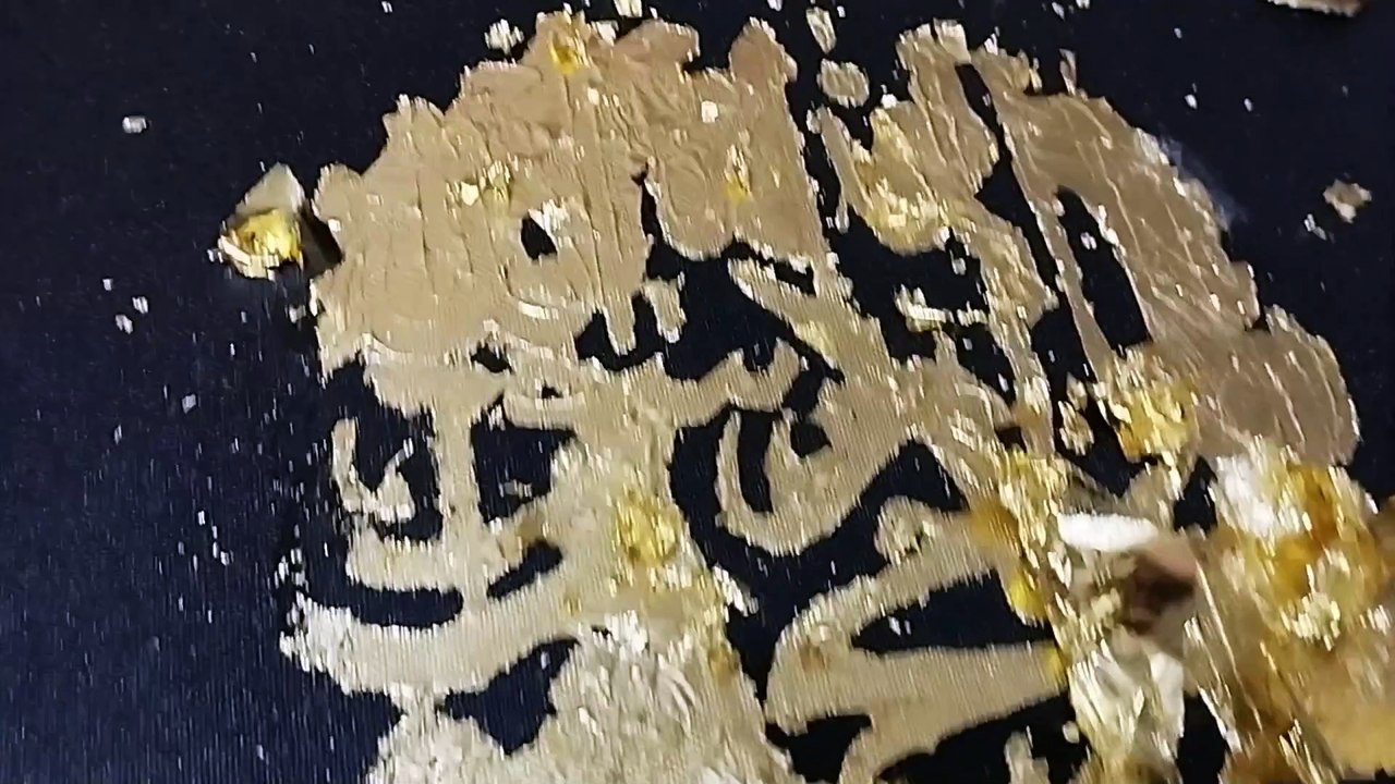 Kalma shahada calligraphy with gold leaf / la i...
